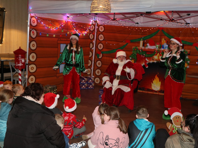 Santa and his elves visit the district 